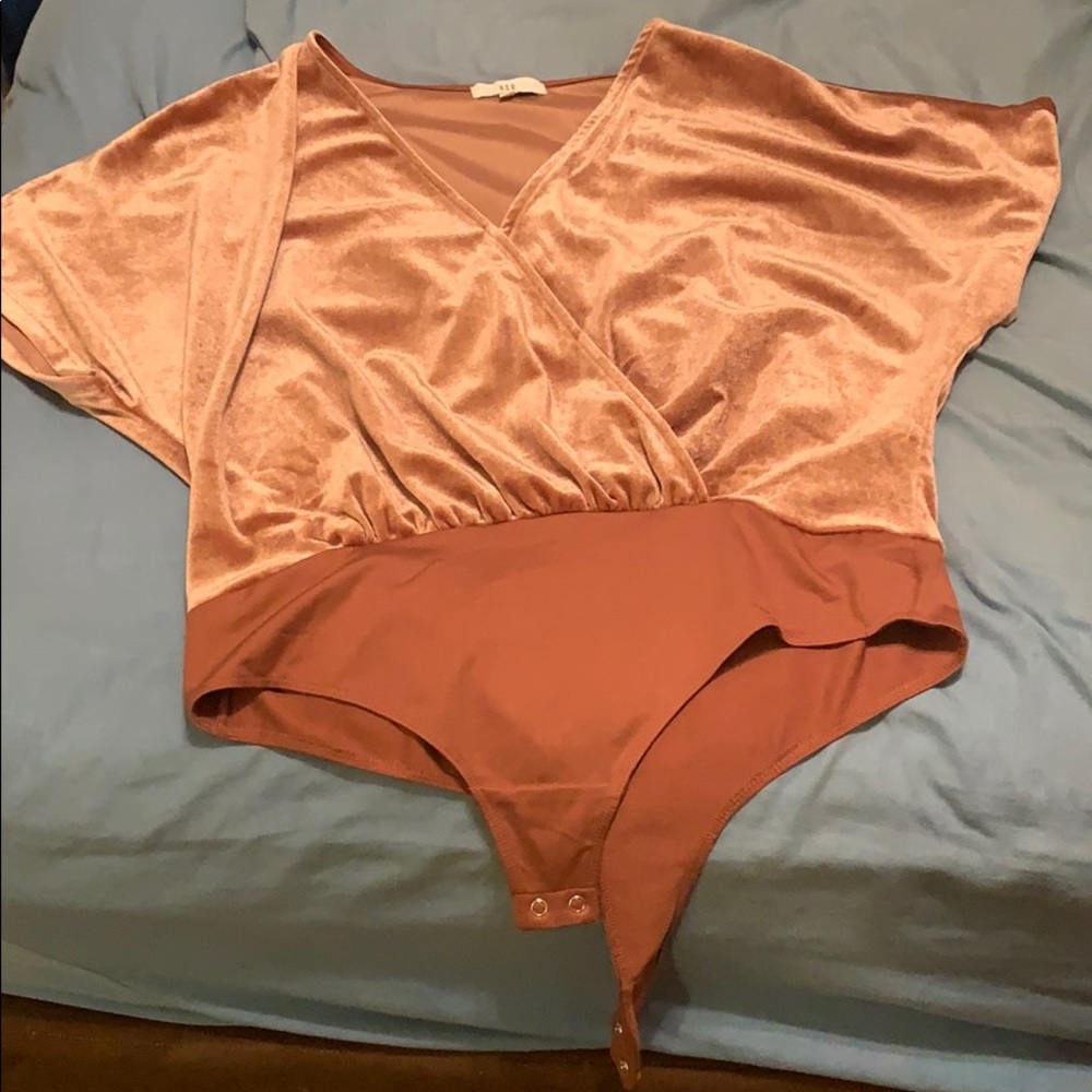 Pink velvet body suit